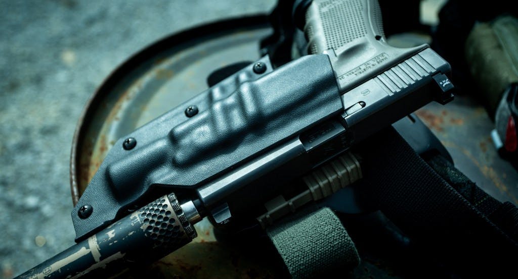 Glock 19 with Trijicon Suppressor sights and Gemtech Tundra